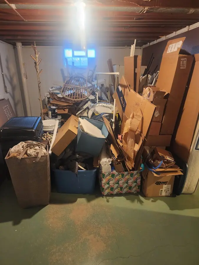 Roll-off dumpster container at job site for Concrete Dumpster Rental in Marion